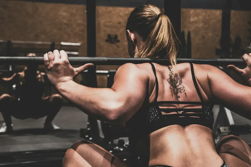 Adjustable dumbbell set displayed for a compact home strength-training space