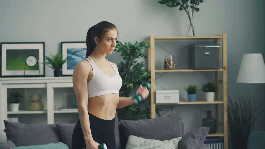 A compact treadmill positioned in a small, tidy home workout area