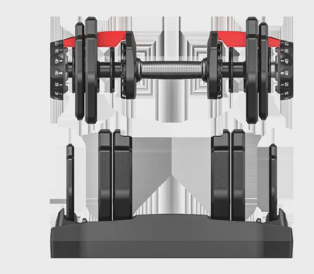 Black adjustable selector dumbbell resting in its storage cradle