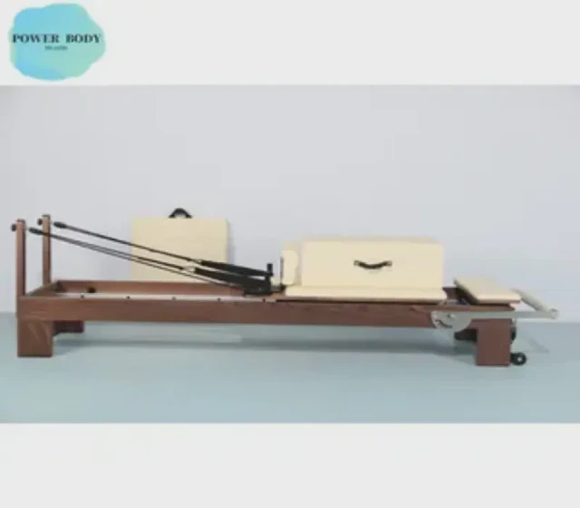 High-End Pilates Studio Walnut Wood Reformer Equipment with a Complete Set of Pilates Accessories shown in its Made-in-China supplier listing